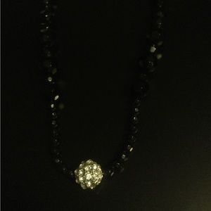 Vintage black faceted glass mourning necklace with rhinestone bead